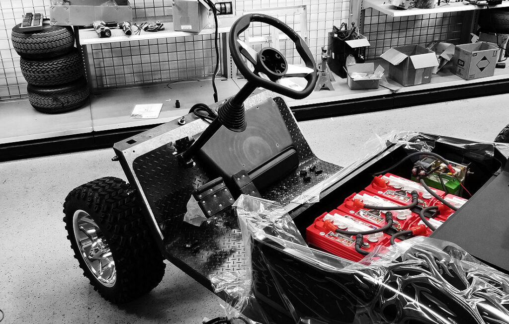 Custom Golf Cart with Deep Cycle Lead-Acid Batteries exposed at Boulevard Carts